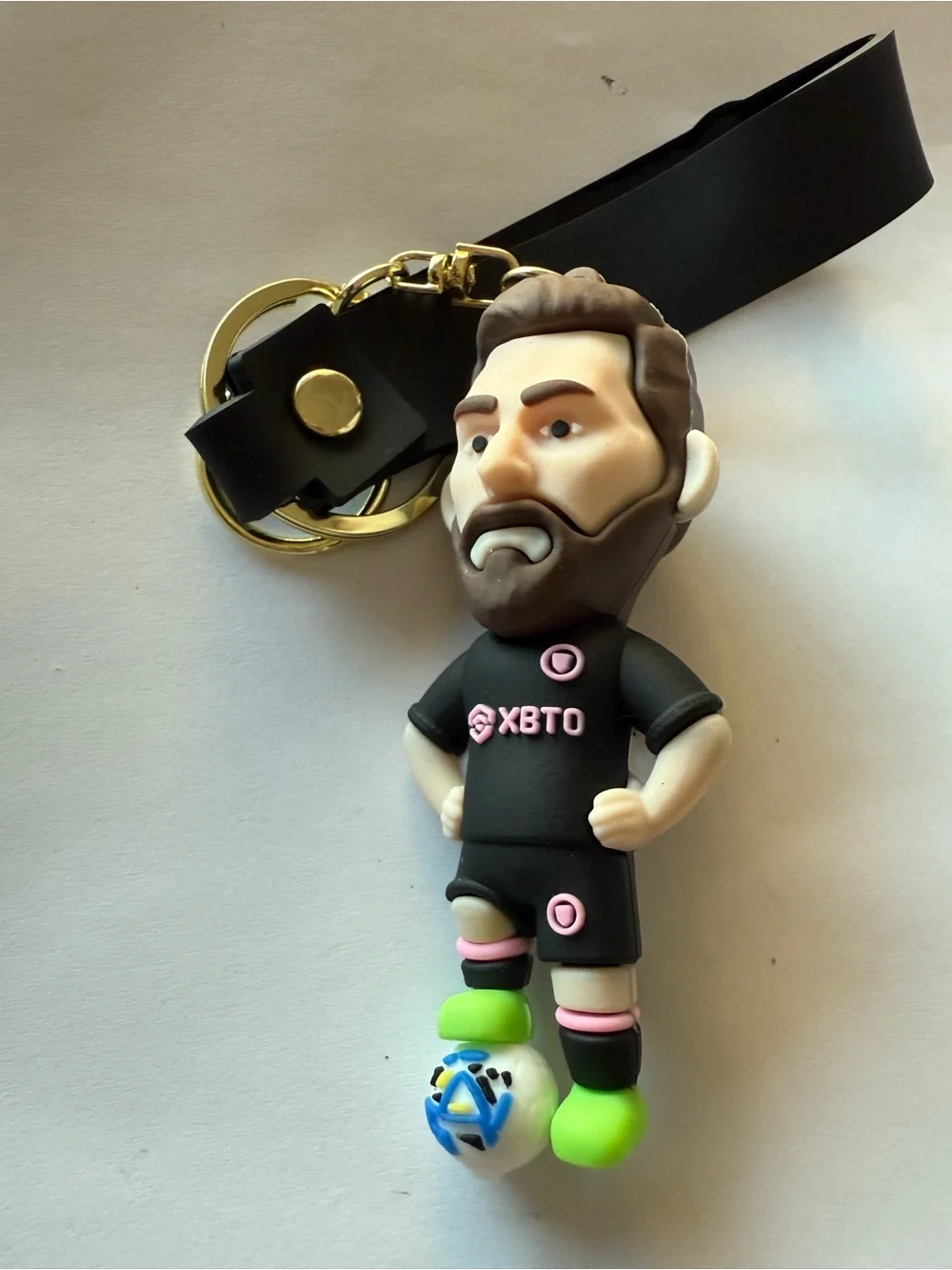 Messi Soccer Keychain - Black and Pink with neon green shoes